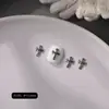Venta al por mayor de accesorios de aleación en forma de cruz, modernos, estilo punk retro plateado, decoraciones metálicas de pentagrama para arte de uñas