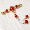 Ágata roja tres vías frotar línea dorada cuentas de barril viejo cuentas redondas Wen jugar accesorios DIY pulsera de mano con cuentas suministro al por mayor