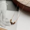 Collar con piedra de ojo de tigre de acero de titanio, elegante personalidad, diseño de nicho Maillard, collar de cadena de clavícula con sentido del sentido, collar con todos los accesorios a juego.
