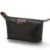 Bolso de gran capacidad con aspecto de alta gama, bolsa de maquillaje de color caramelo, portátil para viajar, bolso pequeño para mujer, bolsa de dumplings, venta al por mayor desde el fabricante