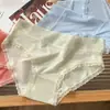 Directamente del fabricante, nuevas sexys bragas de triángulo para mujer de cintura media con ribete de encaje, entrepierna de algodón transpirable de seda helada, talla grande