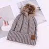 Gorro de Punto Cálido Cómodo Sencillo de Color Sólido Moda Transfronteriza Europea y Americana con Decoración de Pompón Resistente al Viento Adelgazante para la Cara Gorrito Pequeño