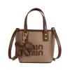 Bolso de Mano Retro de Alta Gama Transfronterizo para Mujer 2025 Nuevo Bolso de Hombro de Gran Capacidad Bolso Cubo Versátil Bolso Cruzado