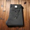Estación europea otoño e invierno algodón grueso elástico lavado pantalones para hombre cintura media rectos holgados pantalones casuales de negocios para hombre