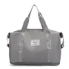 Bolsa deportiva portátil de gran capacidad transfronteriza para fitness, bolsa de viaje diagonal de corta distancia para mujer, bolsa de hombro repelente al agua para yoga, venta al por mayor