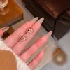 Exquisitos Pendientes de Estrella de Cinco Puntas Micro-Incustados con Diamantes para Mujer, Modernos y Versátiles, Pendientes de Botón Circulares Pequeños y Elegantes, Accesorios para Orejas de Moda al por Mayor
