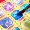 Pinturas de Acuarela Perladas Sólidas Feile Bird 60 Colores Colores Fantasma de Dunhuang Estilo Chino Pintura de Color Portátil Estudiante de Arte Colores de Tendencia Nacional