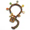 Pulseira do deus da riqueza de cinco vias estilo Xizang oito santos padroeiros cinco mestres Manjushri deus da riqueza amarelo thangka corda tecida à mão pulseira do ano desta vida