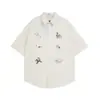 Camisa Divertida de Desenho Animado Manga Curta Verão Masculina Hip-Hop Tendência Vibe Estilo Japonês Solta Casual Camisa com Lapela