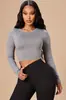 Bestseller transfronterizo europeo y americano, camiseta básica de manga larga cropped de color liso y cuello redondo para mujer, corte ajustado, top base versátil