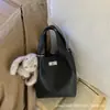 Bolso de Nicho Estilo Francés Bolso Cubo para Mujer 2026 Nuevo Modelo Bolso de Hombro para el Viaje Diario al Trabajo Bolso Cruzado Retro Casual