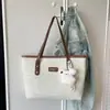Bolsa de mano tipo tote fresca estilo coreano al por mayor para mujer, nuevo modelo verano 2026, bolso de hombro simple color block, bolso de axila para ir al trabajo