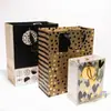 Bolsa de Empaque Yisheng Bolsa de Papel Bolsa de Regalo Personalizada Venta al por Mayor Bolsa de Compras de Papel de Bellas Artes Pequeña Laminación Mate Negra