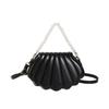 Bolso de mensajero sencillo de moda, nuevo bolso de otoño 2024, bolso de hombro estilo coreano occidental para mujer, bolso de viaje con concha de perla