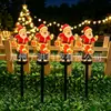 Nuevas luces solares de Navidad para decoración de ambiente, luces de suelo brillantes de Papá Noel, luces para césped de patio exterior