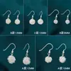 Brincos de bola de seda prateada oca elegantes de luxo leve europeus e americanos, joias de ouvido de metal personalizadas elegantes, da moda, tendência