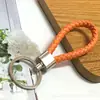 Nuevo Llavero de Cuerda de Cuero Tejido Colgante Creativo para Mochila Llavero Empujar Pequeño Regalo Llavero de Coche Venta al por Mayor