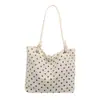 Bolso tote fresco de moda para mujer de este año, nuevo estilo otoño 2026 bolso de hombro chic de lunares, bolso para el antebrazo para ir al trabajo