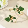 Set de Joyería Transfronterizo Europeo y Americano: Conjunto de Collar, Aretes, Pulsera y Anillo de Flor Multicapa con Goteo de Aceite, Accesorios para Manos, Pulsera