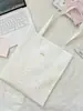 65213 Bolso de Lona Blanco Leche con Puntos y Accesorios de Moño de Encaje, Estilo Casual para Salidas Estudiantiles, Bolso Artístico de Hombro