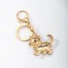 Llaveros lindos de mascotas transfronterizos, varios estilos de gatitos que caminan, aleación de zinc con diamantes de imitación y aceite, llaveros creativos para accesorios de mochila