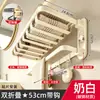 El fabricante suministra estante para toallas de malla plegable de doble capa color bronce de cañón, estante para toallas de baño engrosado montado en la pared sin perforación