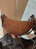Bolsos de Alta Gama de Nicho para Mujer de Comercio Exterior Otoño e Invierno Retro 2025 Nueva Moda Bolso Cruzado Croissant Bolso Sencillo de Bollo