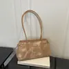 Estilo coreano transfronterizo Gran capacidad Dropshipping 2026 PU Moderno Simple Casual Gran capacidad Bolso de hombro tipo baguette para ir al trabajo