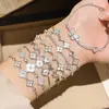 Pulsera de flor de circonita y nácar chapada en oro real de 18k, pulsera de estilo coreano ins de alta gama, joyería versátil de lujo ligero para mujer