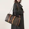 Nueva bolsa de viaje de gran capacidad y tacto de alta gama, se puede usar como bolso de hombro, bolso cruzado, bolso de mano diario, bolsa de equipaje para viajes de negocios y presenta un diseño de estampado vintage