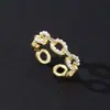 Anillo de perlas para mujer de diseño lujoso y ligero de nicho de alta gama, anillo de apertura ajustable con circonita chapada en oro creativo de moda europea y americana.