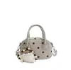 Bolsa de Camurça com Bolinhas Super Popular de Nicho Feminina 2026 Nova Bolsa Transversal Casual Outono/Inverno Bolsa Almofada de Mão com Toque de Luxo