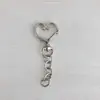 Llavero de corazón de melocotón cadena de 8 caracteres retención de color no es fácil de decolorar proceso de galvanoplastia muñeca joyería accesorios exquisito