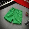 Calça de Praia Shorts Casal Mão Rápida Vermelhos Mesmo Estilo Espírito Social Cara Fino Calça de Três Pontos Shorts Masculino Tendência de Dois Pontos