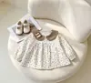 Novedad para Primavera y Otoño: Blusa de Manga Larga Floral Exquisita y Linda con Cuello de Muñeca Versátil para Niñas