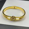 Pulsera europea y americana simple de acero de titanio chapado en oro de 18 quilates con micro incrustaciones de circón colorido de diamante completo, pulsera de moda ins para mujer en stock al por mayor
