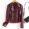 Ropa de mujer de estilo europeo y americano transfronteriza, nueva colección de otoño 2026: cuello solapa, abrigo de piel de oveja con cinturón, chaqueta talla grande