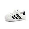 Zapatos de Lona con Cabeza de Concha para Niñas 2026 Nuevo Estilo Otoño Versátiles para Niños Zapatos Deportivos Casuales Ligeros para Niños