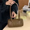Bolso Retro Boston estilo 2026 nuevo, hecho de piel de flor, bolso cilíndrico suave casual, bolso de hombro para mujer, bolso de axila de piel genuina