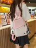 Mochila pequena portátil versátil para estudantes homens de grande capacidade em duas cores, bolsa de peito cruzada simples estilo japonês para mulheres