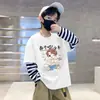 2026 Nueva Camiseta Base Elegante para Bebé Niños Rayas de Dibujos Animados Retazos Manga Larga Temporada de Primavera y Otoño Camiseta de Algodón Puro