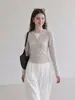 Design coreano senso de cor contrastante falso duas peças botão gola redonda camiseta feminina 2026 outono corte justo modelador versátil manga longa top