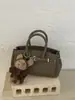 Bolsa Yuezi Fashion Tendência Casual Texturizada 2026 Primavera Nova Estilosa Nicho Moda Feminina Bolsa de Ombro Transversal