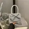 Bolsa Pequeña Cuadrada de Perlas Portátil Estilo Fresco y Dulce al por Mayor para Mujer Bolso de Hombro con Lazo Bolso Cruzado Nuevo Otoño 2025