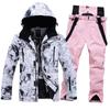 Amantes del traje de esquí de comercio electrónico transfronterizo a prueba de viento Impermeable cálido pantalones de esquí de tabla simple y doble una generación de pelo