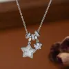 Corrente Elegante para Clavícula Banhada a Ouro Real com Zircônia Micro-Incustada para Mulheres, Colar Estrela de Cinco Pontas em Concha Natural de Design de Nicho Atacado