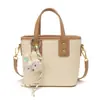 Exquisito y moderno bolso de mano tipo cubo, nuevo bolso cruzado versátil de moda 2026, bolso de hombro popular de venta caliente para mujeres este año