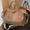 Bolso casual de gran capacidad transfronterizo 2026 para mujer, una opción elegante y sofisticada para viajes cortos, viajes de negocios y como bolso de hombro o cruzado.