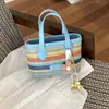 Bolso Cruzado de Mano para Playa de Ocio Vacacional Transfronterizo para Mujer Verano 2026 Nuevo Bolso Tejido de Paja Bolso de Hombro Tipo Cubo