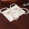 Pulsera de perlas naturales para mujer diseño nicho ins pulsera simple elegante simple cristal de fresa perla barroca